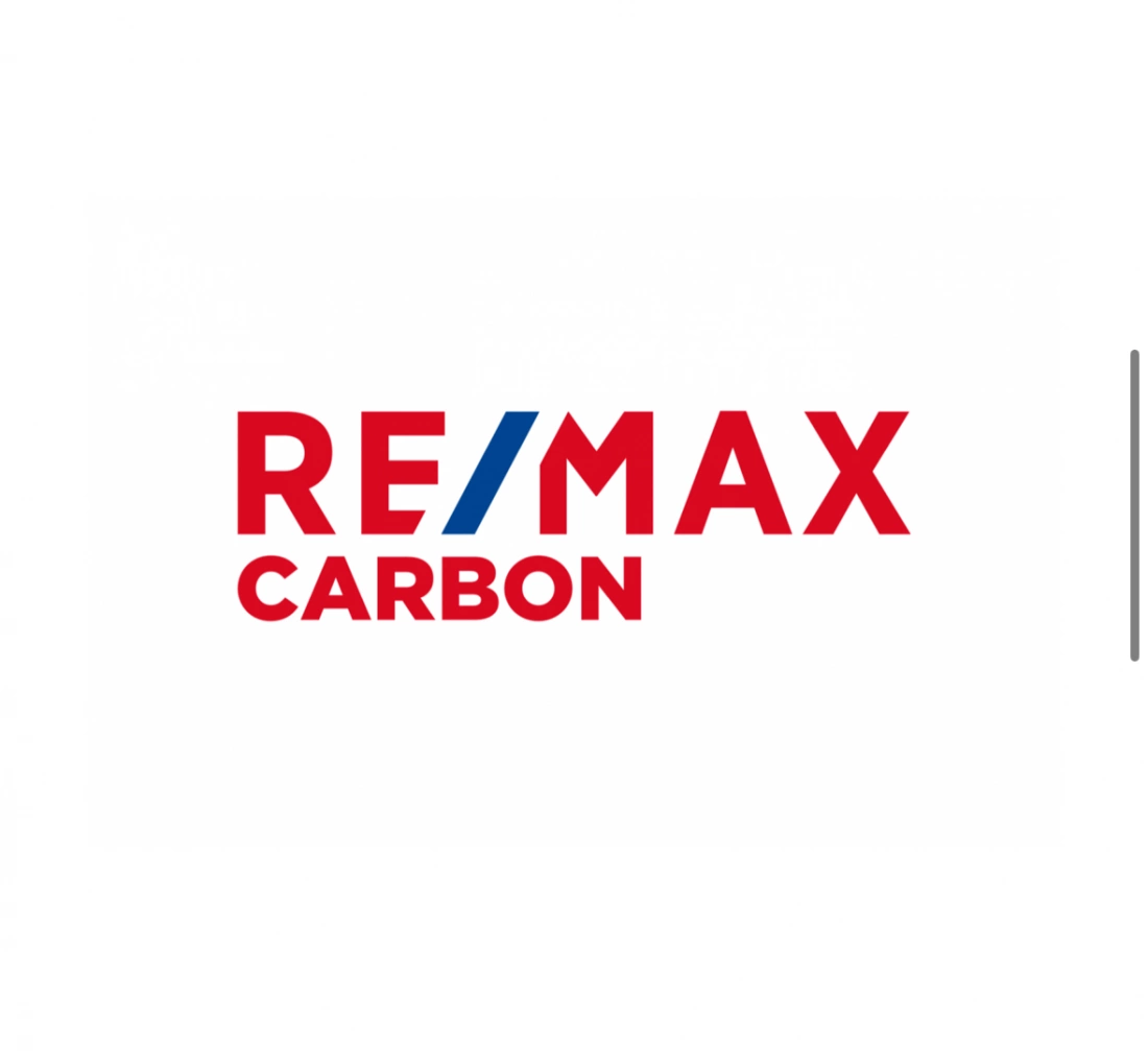 Logo agencji nieruchomości RE/MAX Carbon.