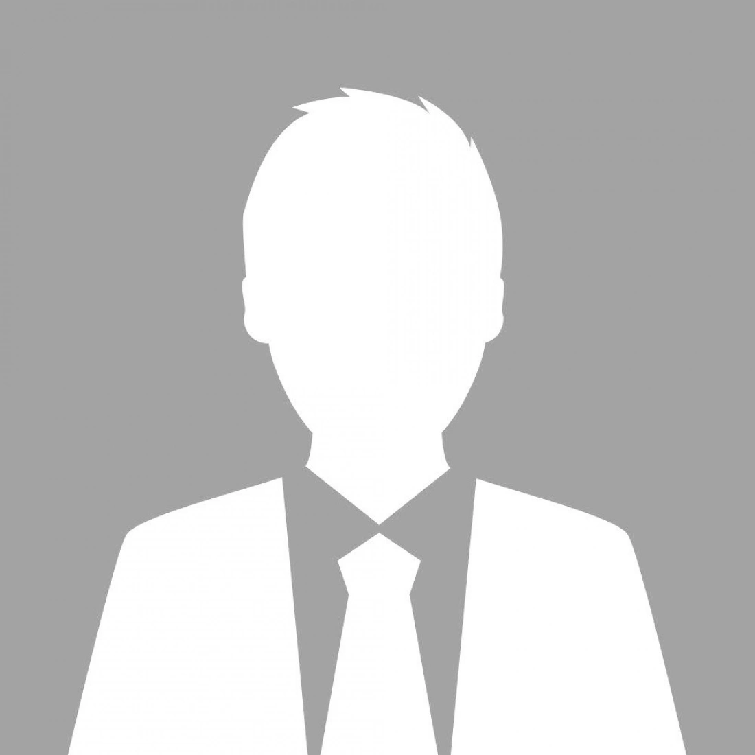 Silhouette mężczyzny w formalnym ubraniu na szarym tle.